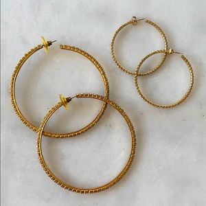 TWO PAIRS: gold hoop earrings